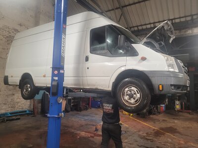 inspecting Van Repair