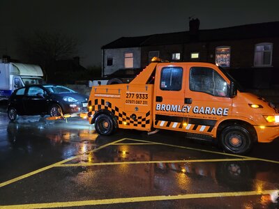 Car Recovery at night in the rain